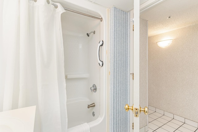 bathroom with shower / tub combo and tile patterned flooring