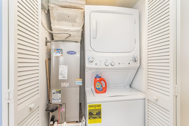 laundry room featuring stacked washing maching and dryer