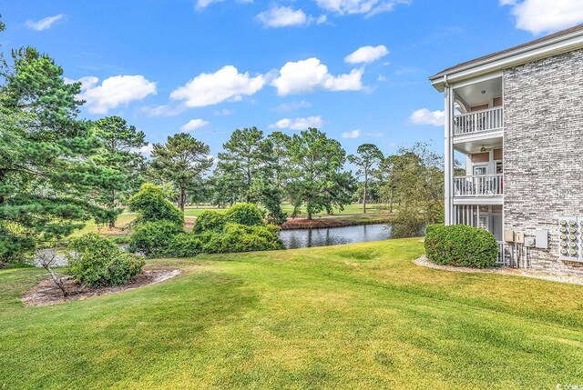 4709 Wild Iris Dr Unit 104, Myrtle Beach, SC 29577 - view of green lawn with a water view
