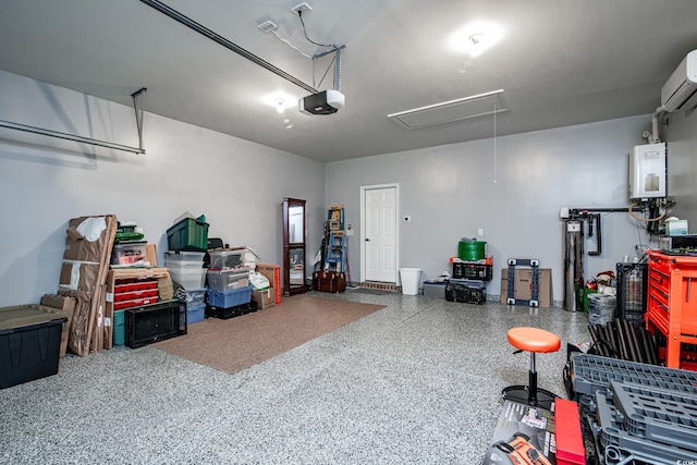 garage featuring water heater, a garage door opener, and an AC wall unit