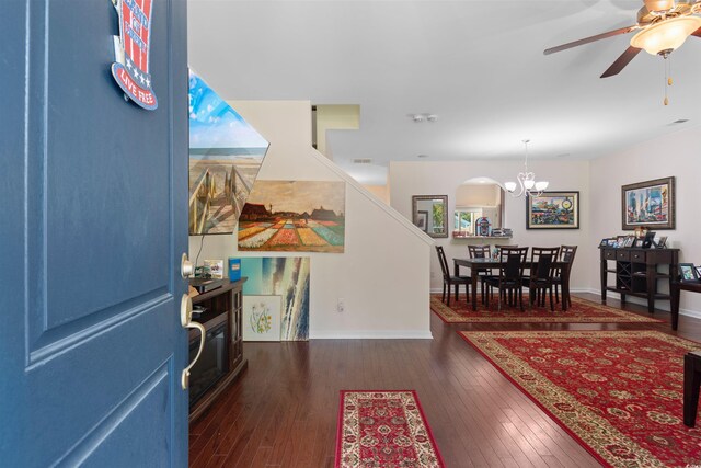 444 Papyrus Cir Unit 444, Little River, SC 29566 - foyer entrance featuring dark wood-type flooring, a chandelier, ceiling fan, and plenty of natural light