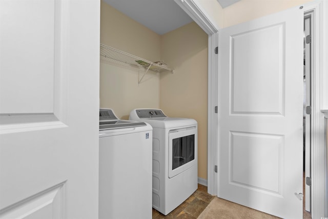 444 Papyrus Cir Unit 444, Little River, SC 29566 - laundry room with washer and dryer and stone finish flooring
