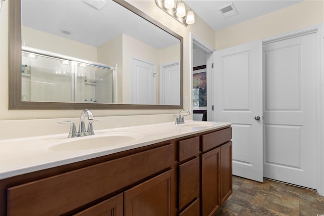 444 Papyrus Cir Unit 444, Little River, SC 29566 - bathroom featuring double vanity, a stall shower, and stone finish floors
