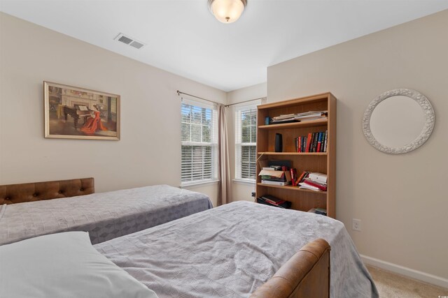 444 Papyrus Cir Unit 444, Little River, SC 29566 - carpeted bedroom featuring baseboards
