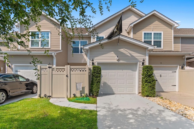 444 Papyrus Cir Unit 444, Little River, SC 29566 - view of front facade featuring driveway and a garage
