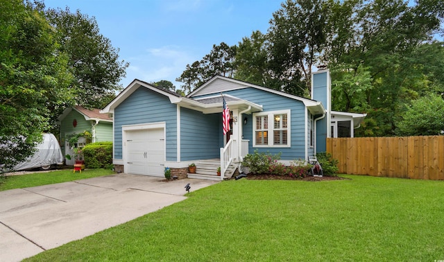 view of front facade featuring a garage and a front yard