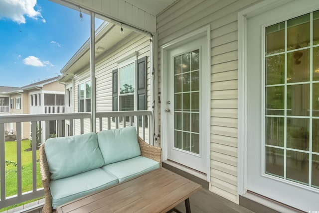 balcony with an outdoor hangout area