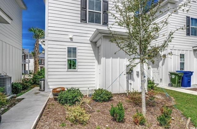 3507 Fountain Ln, Myrtle Beach, SC 29577 - view of exterior entry featuring board and batten siding and central AC