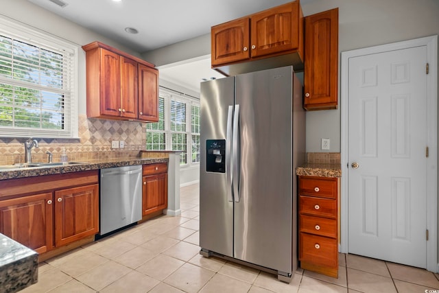 kitchen featuring tasteful backsplash and sink