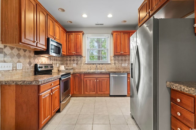 unfurnished dining area with a wealth of natural light, ornamental molding, and light tile patterned floors