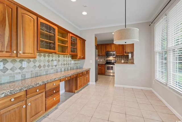 kitchen featuring crown molding, stainless steel appliances, light tile patterned floors, and tasteful backsplash