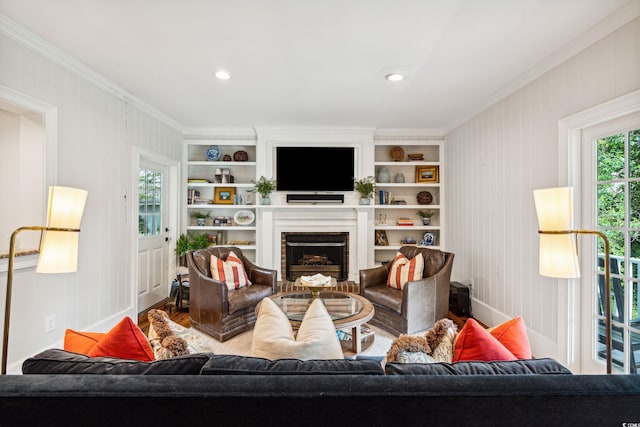 living room featuring crown molding and wood-type flooring