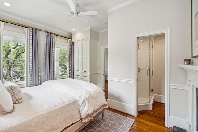 bedroom featuring ceiling fan, hardwood / wood-style flooring, and ornamental molding