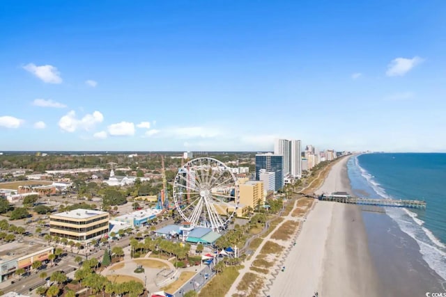 bird's eye view featuring a water view and a view of the beach