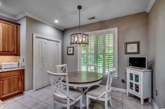 dining room featuring a notable chandelier, light tile patterned floors, and plenty of natural light