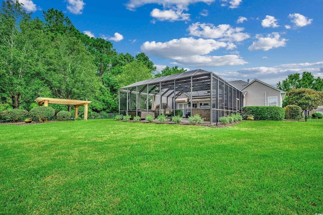 view of yard with glass enclosure