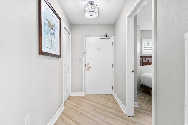 doorway featuring light wood-type flooring