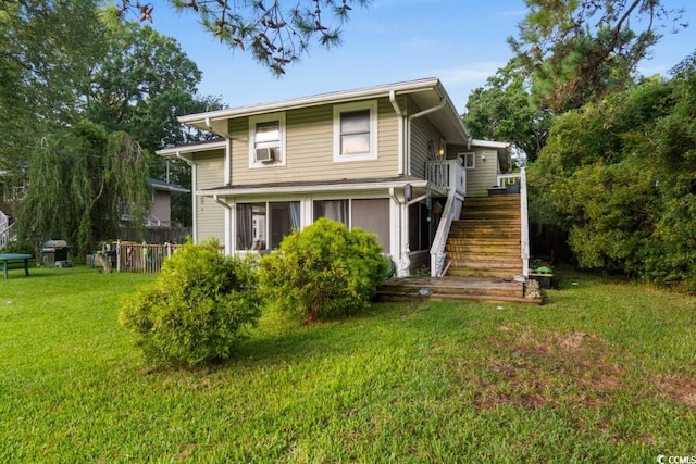 exterior space featuring a front yard and stairway