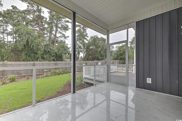 view of unfurnished sunroom