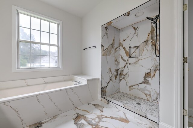 bathroom featuring shower with separate bathtub and tile patterned floors