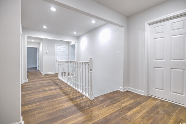 hallway featuring dark wood-type flooring