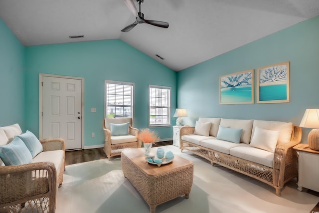 living room featuring ceiling fan, vaulted ceiling, and wood-type flooring