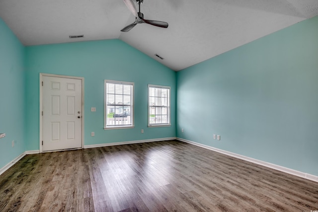 entryway featuring hardwood / wood-style floors, ceiling fan, and lofted ceiling