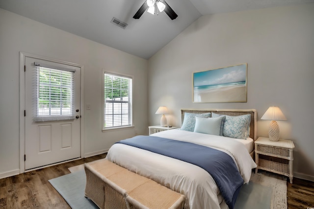 bedroom featuring ceiling fan, vaulted ceiling, and dark hardwood / wood-style flooring