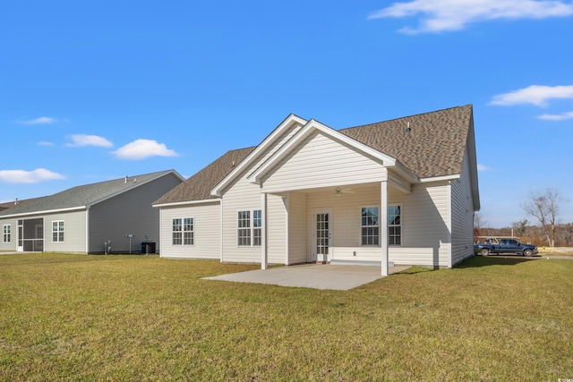 craftsman house featuring a front yard and a garage