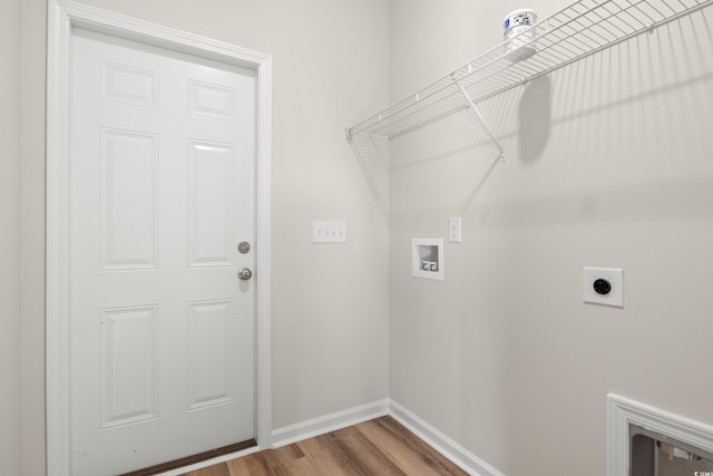 clothes washing area with hookup for an electric dryer, wood-type flooring, and hookup for a washing machine