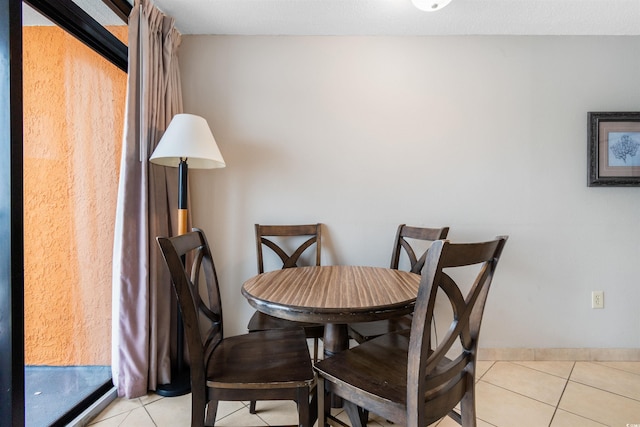 view of tiled dining room