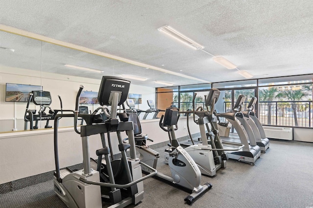 workout area with a textured ceiling