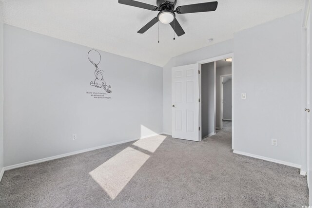 bathroom featuring vanity, a textured ceiling, and toilet