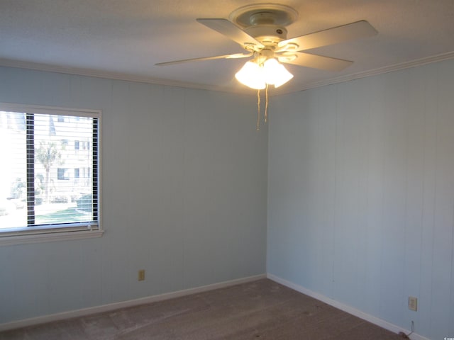 empty room with crown molding, a healthy amount of sunlight, and ceiling fan