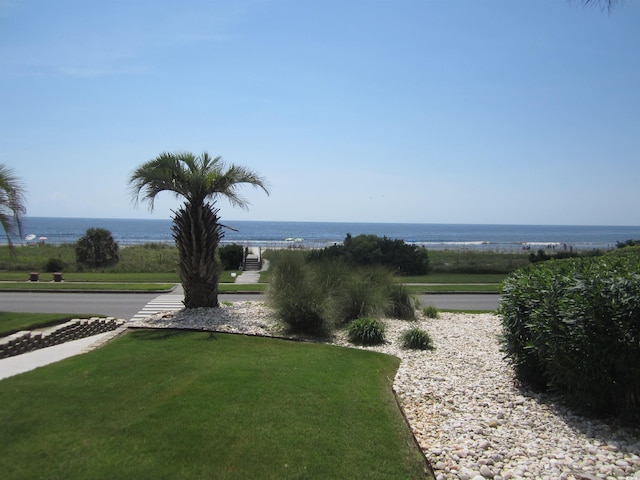 exterior space with a water view