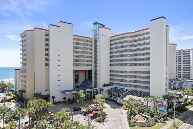 view of building exterior featuring a water view