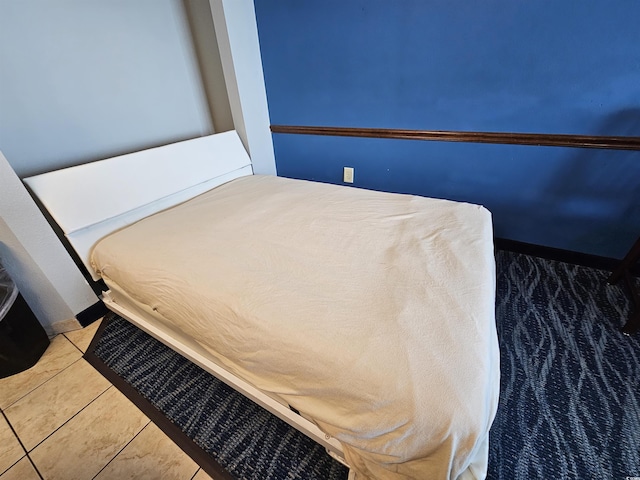 bedroom featuring tile patterned flooring