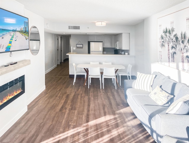 interior space with dark hardwood / wood-style flooring