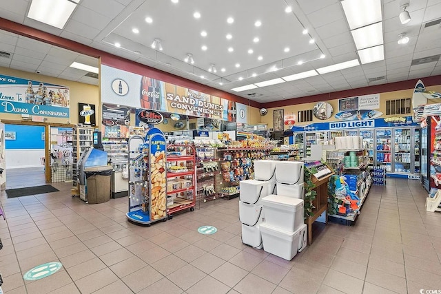 miscellaneous room with light tile patterned floors