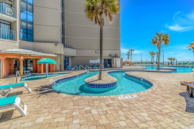 view of pool with a patio area