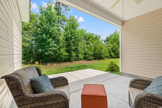 view of patio with ceiling fan