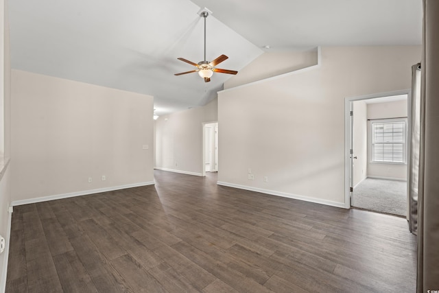 carpeted spare room with high vaulted ceiling and ceiling fan