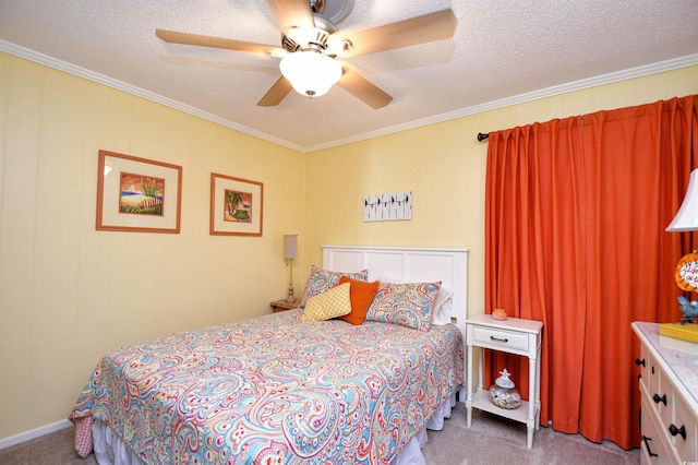 bedroom featuring ceiling fan, carpet flooring, a textured ceiling, and ornamental molding