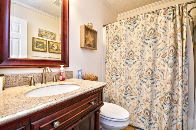 bathroom featuring vanity, a textured ceiling, a shower with curtain, crown molding, and toilet