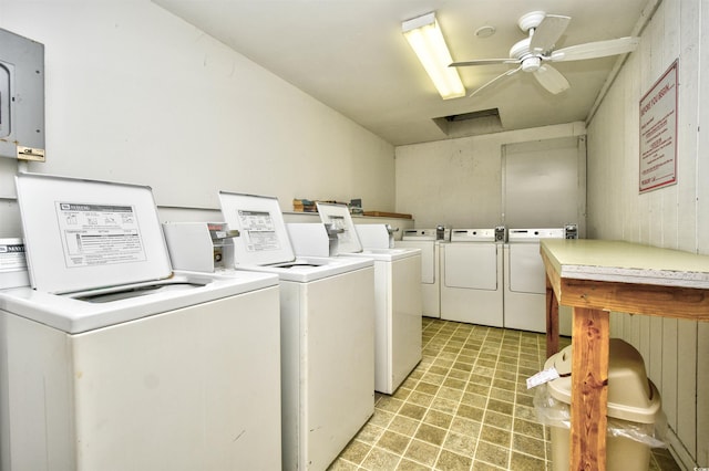 clothes washing area with washing machine and dryer, electric panel, and ceiling fan