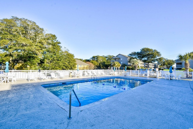 view of pool featuring a patio area