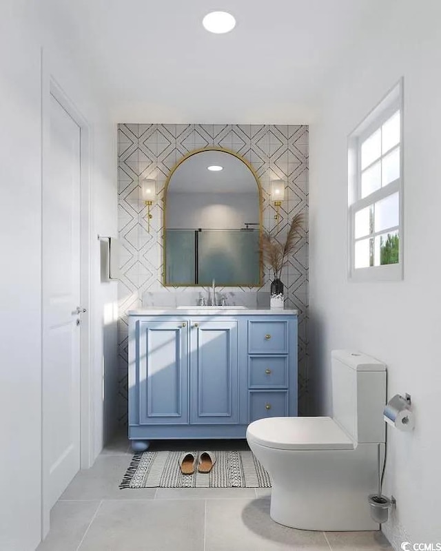 bathroom with vanity and toilet