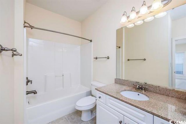 full bathroom with shower / bathtub combination, tile patterned floors, vanity, and toilet