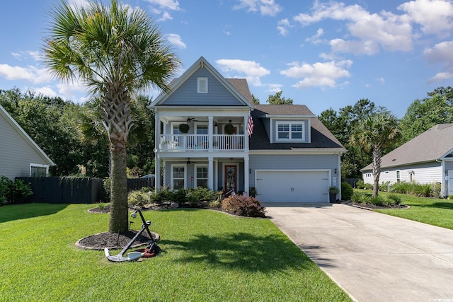 view of front of home with ceiling fan and a front yard