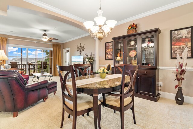 2180 Waterview Dr Unit 634, North Myrtle Beach, SC 29582 - dining space featuring crown molding, light colored carpet, and ceiling fan with notable chandelier